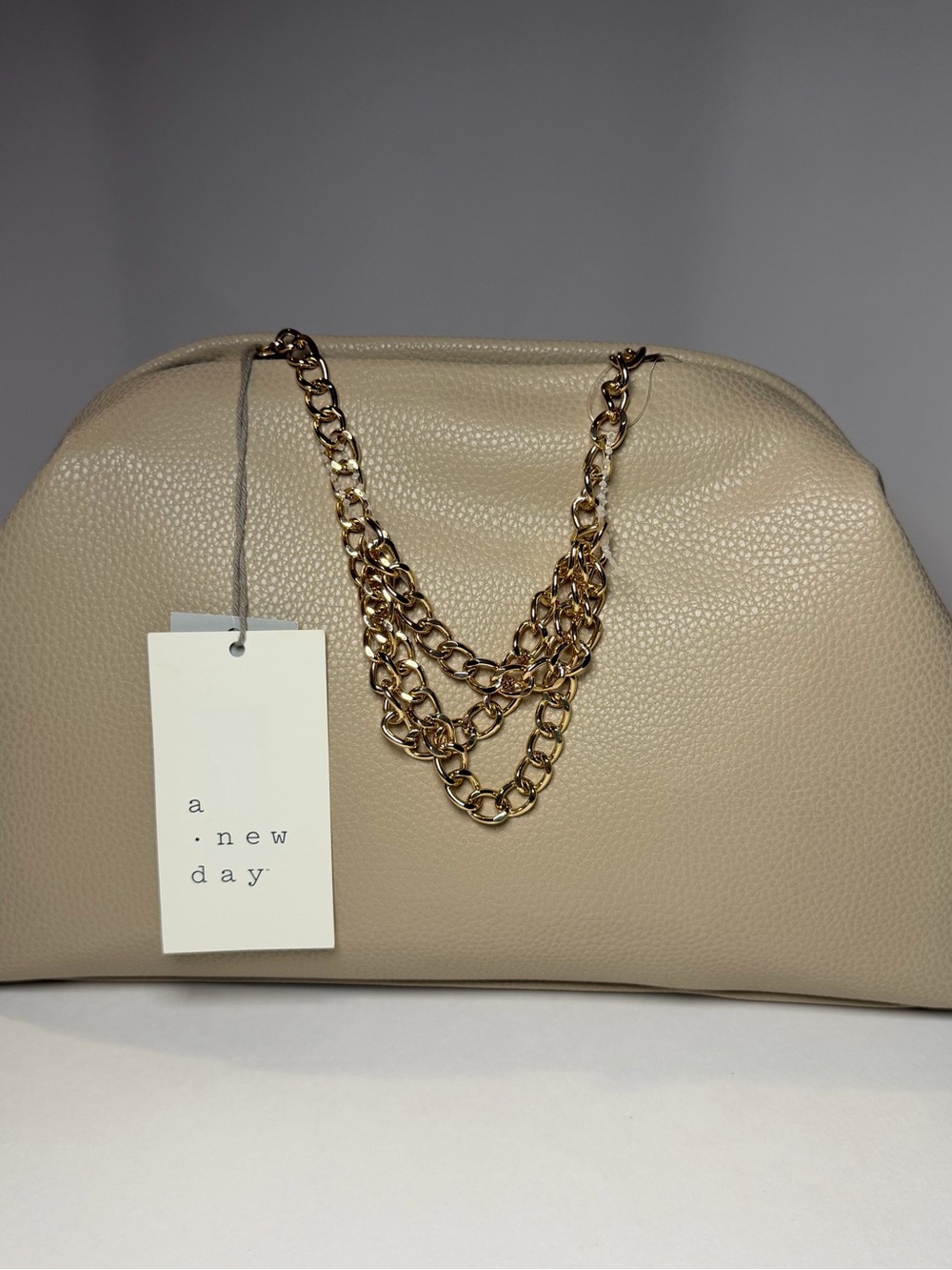 a new day Taupe Clutch with gold chain shoulder strap